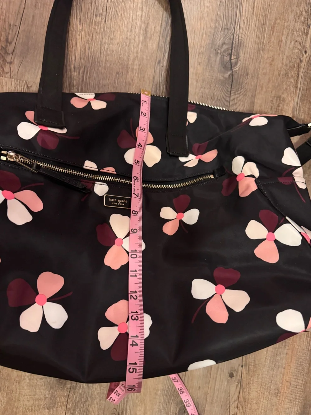 Kate Spade Dawn Dusk Buds Weekender Bag in black with pink floral